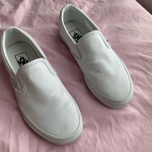 white slip on vans